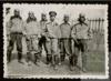 José Delibes Setién destacado, junto a otros compañeros vestidos de aviadores.